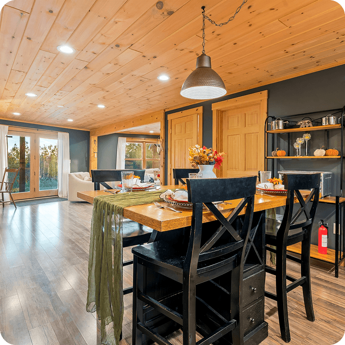 Mountain Vista log cabin interior — comfortable large group space near Sunday River
