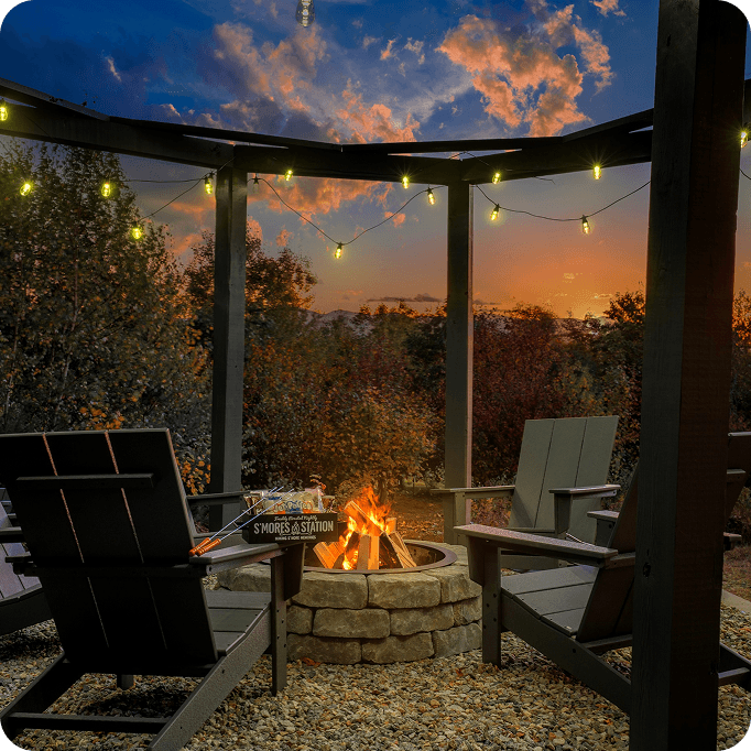 Mountain Vista outdoor fire pit — evening gatherings at Bethel Maine log cabin
